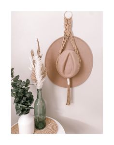 How stylish yet chic is this macrame wall hanging for your favorite hat! Do you have a favorite wide brim hat and you don't know where to put it, well here's the perfect home decor piece for your house. This natural colored macrame wall hanging is an incredibly unique décor piece that will look wonderful in any area of your home. Imagine it in your living room, bedroom, bathroom, or anywhere! Coordinates beautifully with Boho, natural, and whimsical decoration styles. Get it for yourself for as Macrame Hat Hanger, Colored Macrame, Macrame Hat, Hat Organizer, Hat Organization, Hat Holder, Hat Hanger, Decoration Styles, Hat Storage