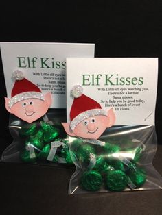 two bags filled with green candies sitting on top of a table next to each other