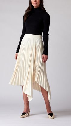 Flowy Asymmetrical Draped Skirt With Pleats, Asymmetrical Flowy Draped Pleated Skirt, Spring Asymmetrical Skirt With Accordion Pleats, Chic Pleated Asymmetrical Draped Skirt, White Flowy Pleated Midi Skirt, Elegant Pleated Draped Skirt For Summer, Elegant Draped Midi Skirt For Spring, Spring Asymmetrical Pleated Skirt With Accordion Pleats, Pleated Asymmetrical Draped Skirt