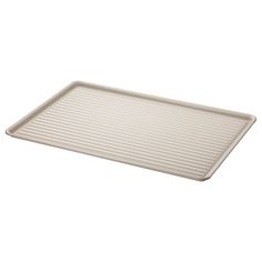 an empty baking sheet on a white background