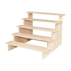 three tiered wooden shelf against a white background