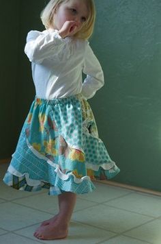 I have had this skirt made for only a few weeks before I listed it, and my daughter has tried to wear it every day!!  Twirling the whole time.This skirt is such a fun skirt for the ULTIMATE Twirl.  When standing in place, it still has the the look like it is twirling.  It's fun, it's new, it's fresh, and it is perfect for Summer!!Comes in size 5-12. I do have a smaller pattern for sizes 1-4, convo me if you would prefer this size.Skirt has 5 or 6 panels that are sewn in, with flounces between ea Cute Tiered Cotton Skirt, Cute Cotton Tiered Skirt, Cute Tiered Lined Skirt, Cute Tiered Skirt With Lining, Playful Blue Cotton Skirt, Playful Cotton Lined Skirt, Playful Fitted Tiered Skirt, Playful Lined Skirt, Girls Circle Skirt