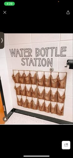 there is a sign that says water bottle station