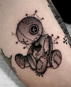 a black and white tattoo design of a teddy bear