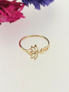 Solid 9ct Yellow Gold Lotus Flower Ring Metal - Genuine 9ct Yellow Gold Sizes - UK H to S, USA 4 to 9 British Hallmarked Made in England Presented to you in a quality branded eco-friendly ring gift box 100% Quality Guaranteed Made with passion and attention to detail with you in mind See what our customers are saying about their jewellery made by Stephen Knapper! https://www.etsy.com/uk/shop/StephenKnapper?ref=seller-platform-mcnav#reviews To see more of our jewellery visit our store https://www