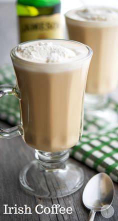 two glasses of irish coffee on a table