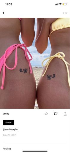 two women with tattoos on their butts and one has a butterfly tattoo on the side