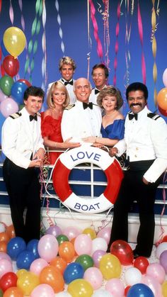 the cast of love boat posing for a photo