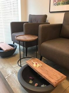 a living room with two chairs and a coffee table