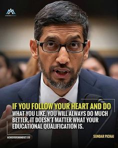 a man wearing glasses and a suit is speaking into a microphone with the caption if you follow your heart and do what you like, it doesn't matter