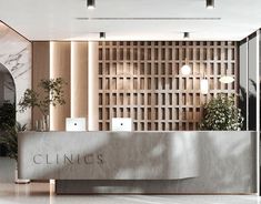 the front desk of clinic with plants and candles