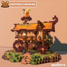 an image of a house made out of legos with pumpkins on the roof