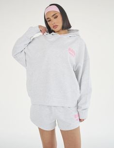 Stay on trend with the Kaiia Design Bubble Logo Hoodie in light grey marl and baby pink. This laid-back and playful hoodie features a unique bubble print design on the front side and back, making it perfect for adding a touch of quirkiness to any outfit. Made with high-quality loopback jersey material, it is not only stylish but also comfortable. Stay cosy and fashionable with this must-have hoodie! Model is 5ft6 and wears size UK 8 Fabric Composition: Loopback jersey, 52% polyester, 48% cotton Bubble Logo, Bubble Print, Hoodie Model, Fox Hoodie, Pink Jumper, Oversized Hoodie, White Fox, Pink Hoodie, Oversize Hoodie