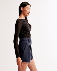 Elevate your wardrobe with the A&F Sloane Tailored Short, a blend of sophistication and comfort. Designed for the modern woman, these shorts offer a chic dark indigo hue that pairs effortlessly with any top.

- Size: 26
- Color: Dark Indigo
- Material: Polyester, Viscose, Elastane
- Gender: Female
- Features: Ultra high rise, figure-flattering pleating, functional fly, pockets, partially elasticated waistband

Crafted from a premium blend of polyester, viscose, and elastane, these shorts ensure Female Features, Short O, Short A, Tailored Shorts, Comfort Design, Tailored Design, Dark Indigo, Menswear Inspired, Modern Woman