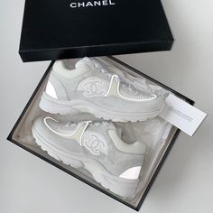 The 'CC' Chanel runner joins the reflective trend. Arguably one of the most popular Chanel sneakers styles to date. This latest version is a must have. Unworn & 100% authentic guaranteed. Supplied in its original packaging. DETAILSAll white colour.Round toe.CC logo to the side.Reflective Need assistance? Use our Sourcery service or speak to a member of our team via WhatsApp Chanel Sneakers, Mens Travel Bag, Fashion Buyer, Homewares Shop, White Colour, Cc Logo, Heeled Loafers, Exclusive Bag, Images Gif