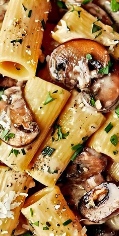 pasta with mushrooms and parmesan cheese in a bowl