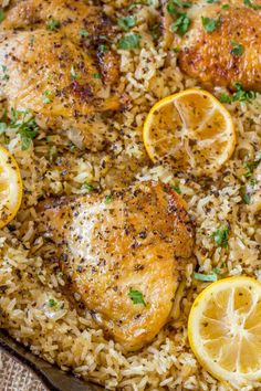 chicken and rice with lemons in a skillet