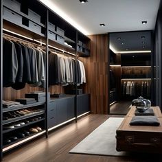 a large walk in closet with lots of clothes