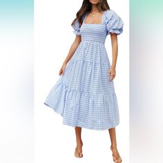 Color: Lightblue/White Product Details Fabric Type One Hundred Percent Rayon Care Instructions Machine Wash Origin Imported Closure Type Pull On About This Item Size Guide: Small=Us 4-6, Medium=Us 8-10, Large=Us 12-14, X-Large=Us 16-18. Be Cute And Feminine With This Flowy Dress! Featuring This Season's Lush And Super Sweet Baby Doll Silhouette, You'll Living For This Midi Dress's Ruched Bust Style, Ruffled Skirt, Back Lace-Up Design And Cute Puff Sleeves! Just Stand And Smile, This Midi Dress H Blue Square Neck Smocked Summer Dress, Summer Light Blue Puff Sleeve Midi Dress, Summer Light Blue Puff Sleeve Dress With Ruffles, Light Blue Puff Sleeve Dress With Ruffles, Beach Midi Dress, Blue Midi-length Tiered Beach Dress, Doll Silhouette, Dainty Jewellery, Summer Plaid