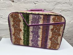 This adorable suitcase is vibrant and funky and would make a great addition to any retro collection! In good vintage condition, small rip in the vinyl inside and a stain on the vinyl inside. See pics!  Measures: 18x12x4 Retro Rectangular Cases With Luggage Sleeve, Retro Collection, Soft Autumn, Suitcase Traveling, Suitcases, Vintage Pattern, Clothing Patterns, Stain, Accessory Gift