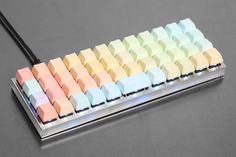 a keyboard made out of pastel colored blocks