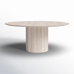 a round table with a white base on a grey background