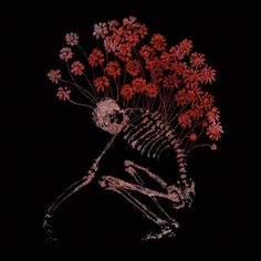 a skeleton with flowers in it's hand