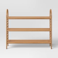 a wooden shelf with three shelves on each side