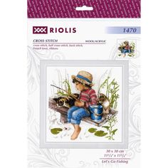 cross stitch kit featuring a boy and his dog sitting on a bench with flowers in the background