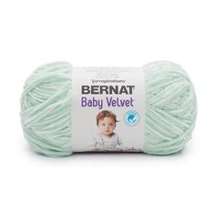 bernat baby velvett yarn ball in light green, on a white background