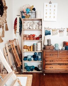 a room filled with lots of different types of crochet and knitting yarns