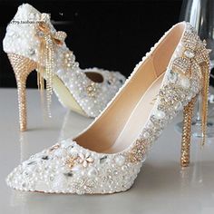 Category:Wedding Shoes; Upper Materials:PU; Embellishment:Bowknot,Imitation Pearl,Flower; Heel Type:Stiletto; Gender:Women's; Toe Shape:Pointed Toe; Type:Wedding Heels,Bridal Shoes,Bridesmaid Shoes; Style:Luxurious,Fashion,Business,Sexy; Outsole Materials:Rubber; Occasion:Wedding,Party; Closure Type:Loafer; Pattern:Floral,Butterfly; Listing Date:07/05/2024; Production mode:Self-produce; 2024 Trends:Dress Shoes,Sexy Shoes,Tassel Shoes; Foot Length:; Foot Width:; Size chart date source:Provided by Wedding Toes, Rhinestone Wedding Shoes, Crystal Pumps, Bridal Pumps, Ivory Shoes, Pearl Bride, Tassel Shoes, Wedding Pumps, Rhinestone High Heels