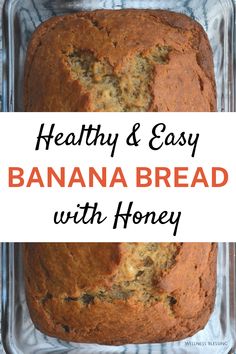 simple healthy banana bread with honey in a glass baking pan on a white and black background