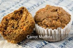 two muffins sitting next to each other on top of a blue and white cloth