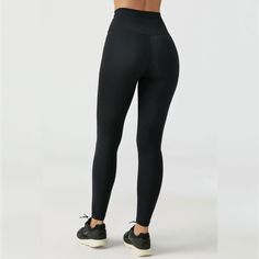 Joah Brown's Second Skin Legging is a must have basic for your workout wardrobe. High-waisted and form-fitting full-length leggings with a flattering V-shaped waistband. It features body-contouring fabric that feels like a second skin that is super soft and stretchy. Now available in sueded onyx! Size Chart X/S (0-4) S/M (4-8) M/L (8-10) The Fit Model is 5'8'' wearing a size X/S Features Fabric: 76% Polyester, 24% Spandex Hugs curves for a sleek and sculpted look Designed to retain its shape all