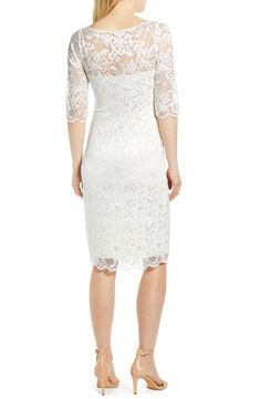 With a bit of shimmer and cut in a vintage style, this bump-flattering sheath of floral lace is simply perfect for weddings and other special events. Slips on over head Bateau neck Three-quarter sleeves Get the perfect fit—book an appointment with one of our alterations experts Lined 94% nylon, 6% spandex Dry clean Made in the UK Elegant Mother Of The Bride Lace Dress, Elegant Lace Mother Of The Bride Dress, Elegant Mother Of The Bride Dress With Lace Back, Elegant Scalloped Lace Mother Of The Bride Dress, Classic Fitted Lace Dress For Formal Occasions, Feminine Sheath Lace Wedding Dress, Formal Lace Back Mother Of The Bride Dress, Elegant Fitted Lace Dress For Mother Of The Bride, Feminine Sheath Lace Dress For Wedding