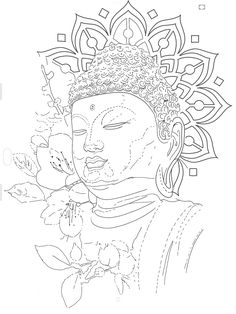 a buddha statue with flowers in front of it and an intricate design on the back