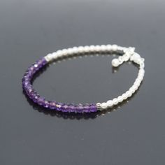 Skinny Gemstone Bracelets with amethyst and tiny natural irregular 3-3.5mm white real freshwater seed pearls. This minimal and modern bracelet is handcrafted.  ✤ Feminine, unique, dainty! Great gift for February birthdays! The beaded bracelet is very comfortable to wear and looks great on its own or stacked with other bracelets.  ✤ Natural Amethyst Gemstones, measuring 4 mm Amethyst stimulates the third eye crown and etheric chakras. It helps in enhancing cognitive perception as well as accelera Bracelet Minimal, Modern Bracelet, Modern Bracelets, February Birthday, Bracelet Pearl, Birthstone Bracelet, Les Chakras, Women Bracelet, Bracelet Gemstone