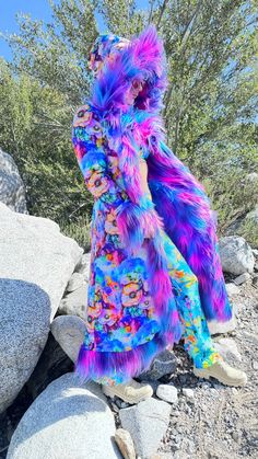 Electric Daisy Faux Fur Coat: Ignite Your Festival Spirit! Step into a world of vibrant energy and dazzling color with the Electric Daisy Fur Coat. Perfect for festivals and a bright, lively lifestyle, this coat will make you the star of any event. Electric Daisy Fur Coat bursts with purple, blue, pink, and turquoise neon colors, reflecting the vivacity and excitement of festival life. Power up your magic with this enchanting boho coat. This coat will be handmade for you in San Francisco. FEATUR Fitted Multicolor Long Outerwear, Funky Multicolor Winter Outerwear, Funky Long Sleeve Winter Outerwear, Funky Multicolor Fall Outerwear, Multicolor Outerwear For Fall Costume Party, Fitted Multicolor Long Coat, Multicolor Winter Outerwear For Costume Party, Multicolor Outerwear For Winter Costume Party, Tiy Diy