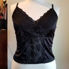 Brand New Old Stock! Avenue Body From Lane Bryant. Black Essential Cami. Satin Smooth Body With Soft Lace Front Detail. 96% Nylon/ 4% Spandex 17.5" Flat, Measured At Back Cups Will Accommodate Larger Cup Sizes 38" Around Elastic At Underbust 42" Around Bottom 23.5" Long From Straps At Longest Length Straps Are Adjustable Stretch Black Camisole For Night Out, Black Stretch Camisole For Night Out, Black Fitted Camisole For Loungewear, Body Lace, Black Lululemon Leggings, Grey Cropped Hoodie, Black Suit Jacket, Animal Print Skirt, Body Black