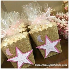 pink and gold popcorn boxes with stars on them