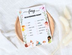 a fairy scavenger hunt on a wooden plate