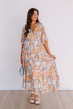 - Your style will blossom like a wildflower with this breezy dress! - Lightweight material with floral print - A built-in partial skirt lining ending thigh length - A v-cut neckline with two hidden hook and eyes for additional coverage - Loose short sleeves - A cinched waistline with an elastic back - A flowy yet flattering silhouette that ends in a straight maxi length hemline Skirt Lining, Breezy Dress, Loose Shorts, Persimmon, V Cut, V Cuts, Floral Maxi, Wild Flowers, Blossom