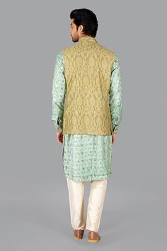 Sage green handwoven banarasi silk nehru jacket with cutwork embroidery. - Aza Fashions Green Chanderi Nehru Jacket With Zari Work, Green Chanderi Nehru Jacket For Transitional Season, Designer Green Chanderi Nehru Jacket, Transitional Designer Nehru Jacket In Pista Green, Traditional Green Raw Silk Nehru Jacket, Fitted Green Nehru Jacket With Dabka Detailing, Transitional Green Chanderi Nehru Jacket, Designer Embroidered Green Nehru Jacket, Designer Fitted Green Nehru Jacket