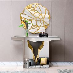 a table with a mirror and vase on it