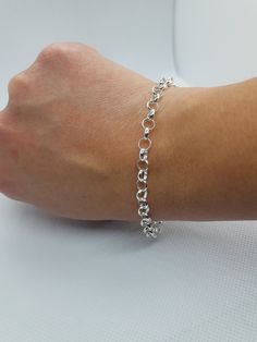 This beautiful delicated bracelet has been carefully crafted in solid 925 sterling silver. Great for any ocassion! Buy it for your-self or for someone you love . Bracelet can also be resized at no extra cost and it will be shipped to you in an elegant gift box. A tracking shipping number will be provided to you once the bracelet has been mailed. Bracelet length: 8 inches Weight: 5.1 grams Materials: 925 Solid Sterling Silver, also available in 10k Yellow Gold Lobster claw Thanks for visiting my Silver Charm Bracelet With Rolo Chain For Gift, Classic Sterling Silver Charm Bracelet With Silver Chain, Silver Hypoallergenic Link Charm Bracelet, Sterling Silver Bracelets With Rolo Chain, Sterling Silver Link Bracelets With Rolo Chain, Gift Silver Chain Bracelet, Sterling Silver Jubilee Charm Bracelet In White Gold, Classic Bracelet With Sterling Silver Clasp As Gift, Sterling Silver Bracelet With Rolo Chain For Everyday