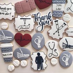 decorated cookies with thank you written on the top and bottom, along with other cookie decorations