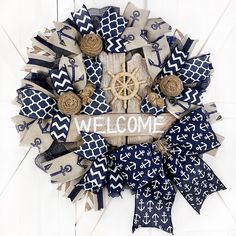 a welcome wreath with burlocks and anchors