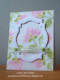 a card with pink flowers on it