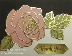 a close up of a thank you card with a rose and leaves on the front